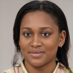 Joyful latino young-adult female with medium  brown hair and brown eyes