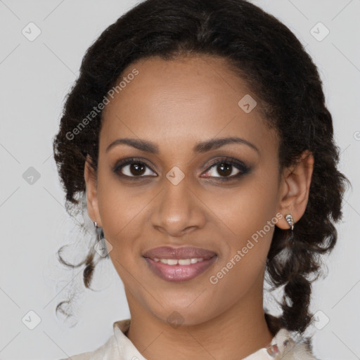 Joyful black young-adult female with medium  brown hair and brown eyes