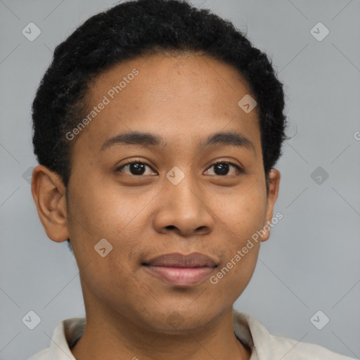 Joyful latino young-adult male with short  brown hair and brown eyes