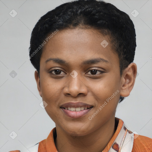 Joyful latino young-adult female with short  brown hair and brown eyes