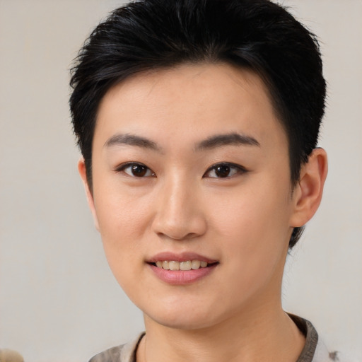 Joyful white young-adult female with short  black hair and brown eyes