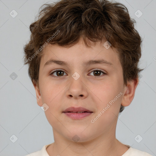 Joyful white child male with short  brown hair and brown eyes