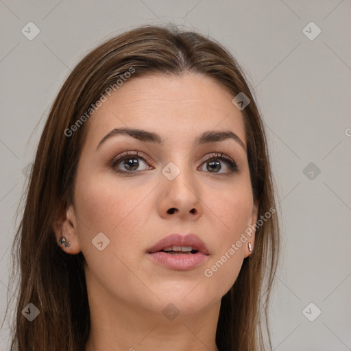 Neutral white young-adult female with long  brown hair and brown eyes