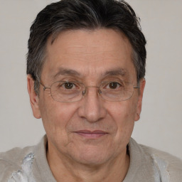 Joyful white middle-aged male with short  brown hair and brown eyes