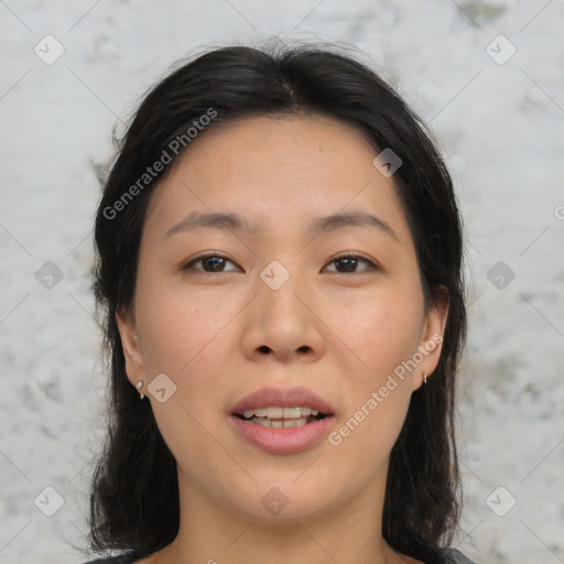 Joyful asian young-adult female with medium  brown hair and brown eyes