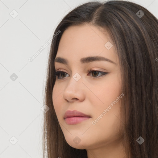 Neutral white young-adult female with long  brown hair and brown eyes