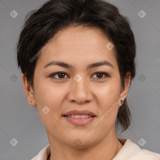 Joyful latino young-adult female with short  brown hair and brown eyes