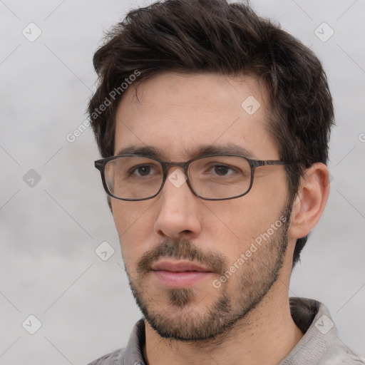 Neutral white young-adult male with short  brown hair and brown eyes