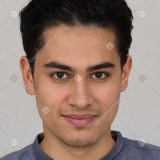 Joyful latino young-adult male with short  brown hair and brown eyes