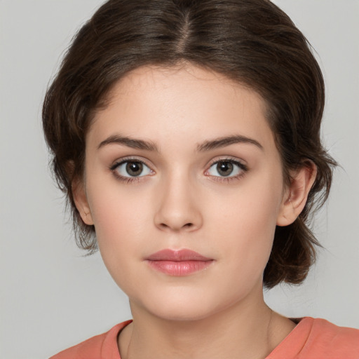 Neutral white young-adult female with medium  brown hair and brown eyes