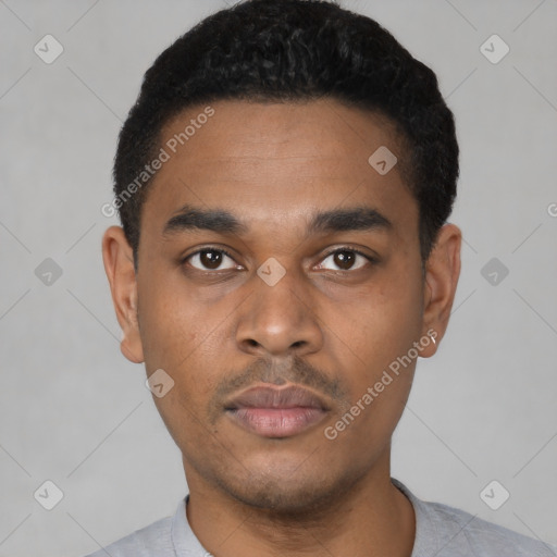 Neutral latino young-adult male with short  black hair and brown eyes