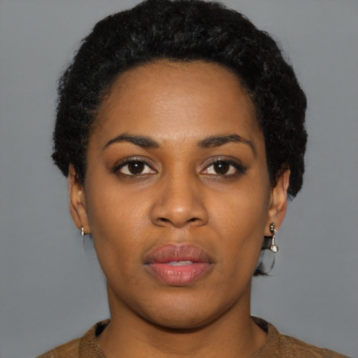 Neutral black young-adult female with short  black hair and brown eyes