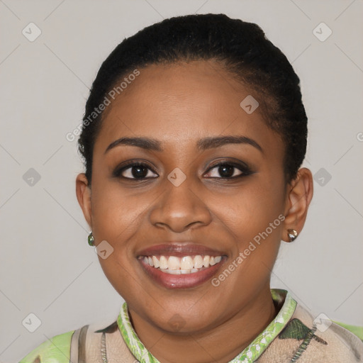 Joyful black young-adult female with short  brown hair and brown eyes