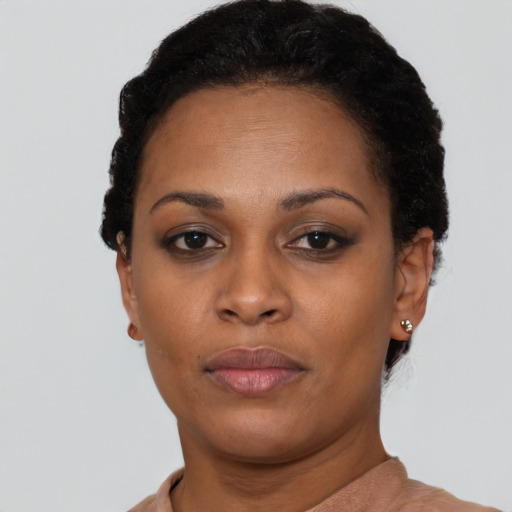 Neutral black young-adult female with short  black hair and brown eyes
