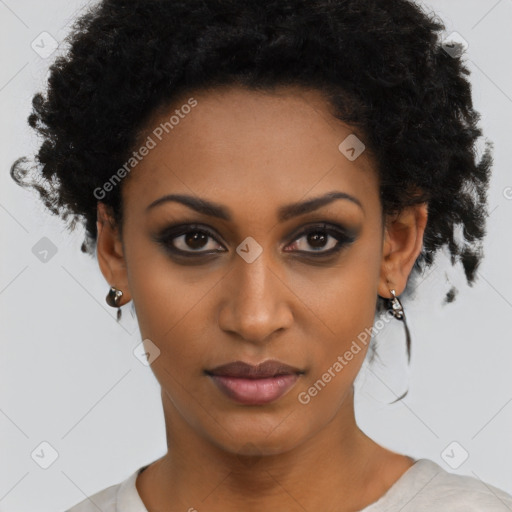 Joyful black young-adult female with short  black hair and brown eyes