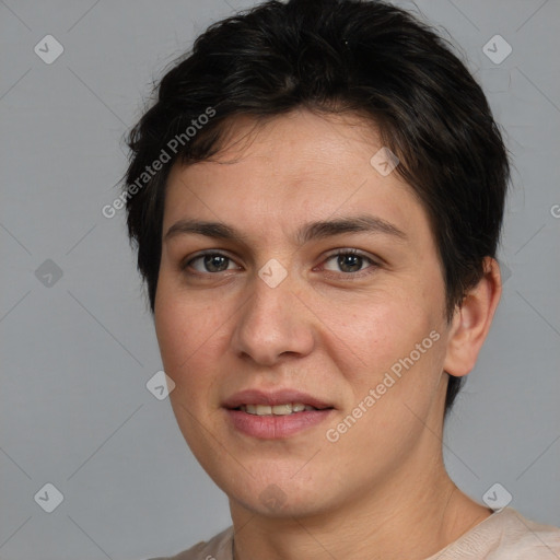 Joyful white young-adult female with short  brown hair and brown eyes