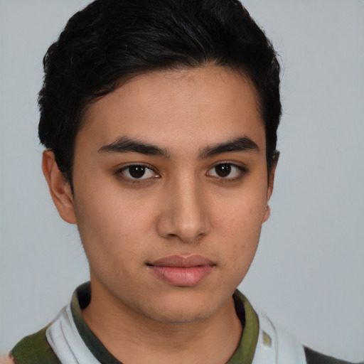 Neutral latino young-adult male with short  brown hair and brown eyes