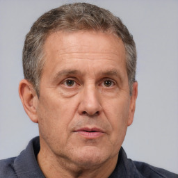 Neutral white middle-aged male with short  brown hair and brown eyes