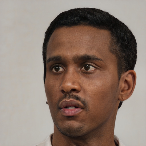 Neutral black young-adult male with short  black hair and brown eyes