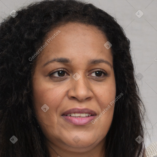 Joyful latino adult female with long  brown hair and brown eyes