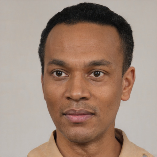 Neutral latino adult male with short  black hair and brown eyes