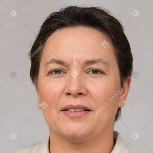 Joyful white adult female with short  brown hair and brown eyes