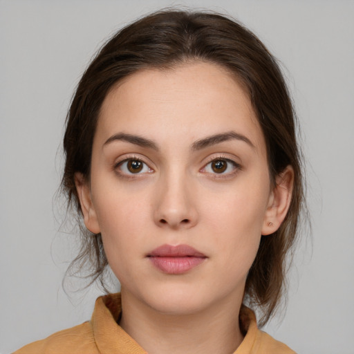 Neutral white young-adult female with medium  brown hair and brown eyes