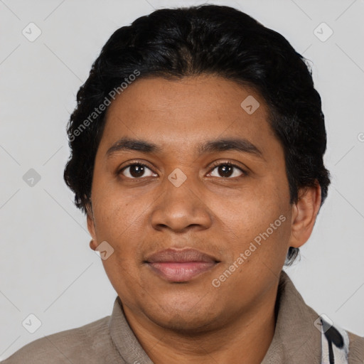 Joyful latino adult male with short  black hair and brown eyes
