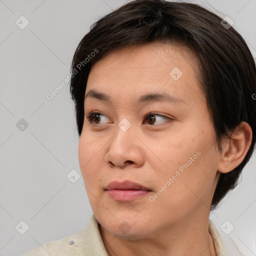 Joyful white young-adult female with medium  brown hair and brown eyes