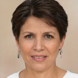 Joyful white adult female with short  brown hair and brown eyes