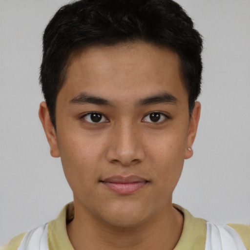 Neutral latino young-adult male with short  brown hair and brown eyes