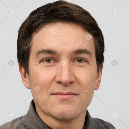 Joyful white adult male with short  brown hair and grey eyes