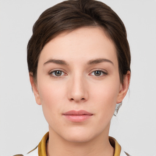 Neutral white young-adult female with short  brown hair and grey eyes