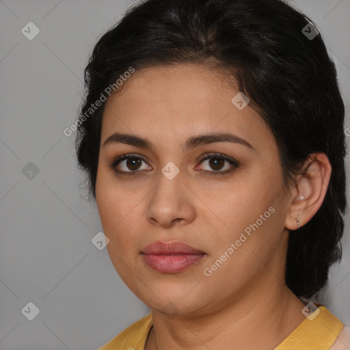 Joyful latino young-adult female with medium  brown hair and brown eyes