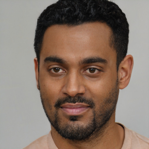 Neutral black young-adult male with short  black hair and brown eyes