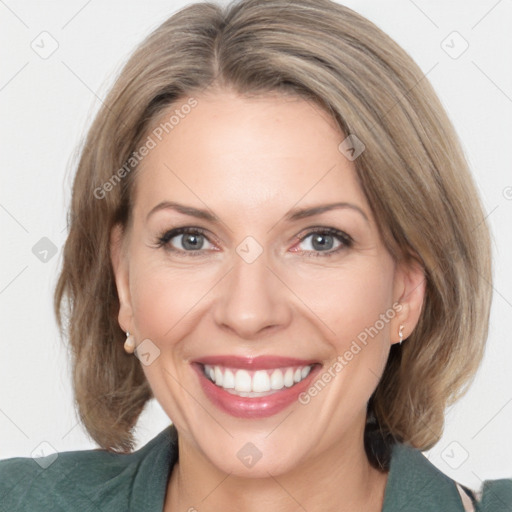 Joyful white adult female with medium  brown hair and grey eyes