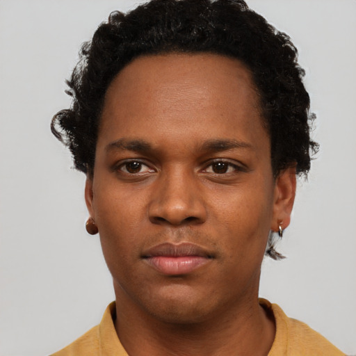 Neutral black young-adult male with short  brown hair and brown eyes