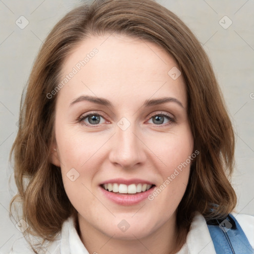 Joyful white young-adult female with medium  brown hair and green eyes