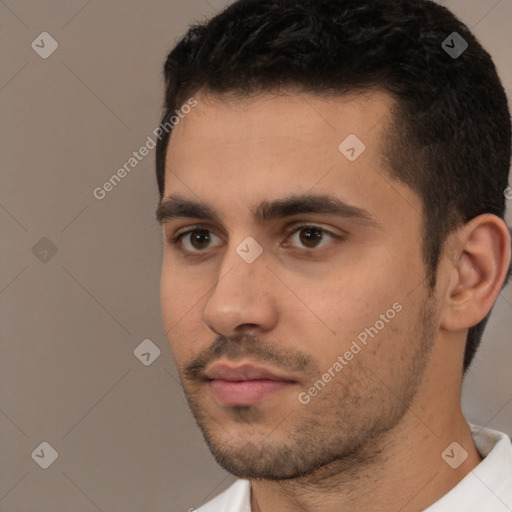 Neutral white young-adult male with short  black hair and brown eyes