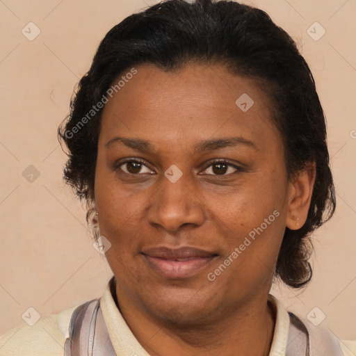 Joyful latino adult female with short  brown hair and brown eyes