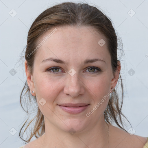 Joyful white young-adult female with medium  brown hair and grey eyes