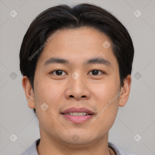 Joyful asian young-adult male with short  brown hair and brown eyes