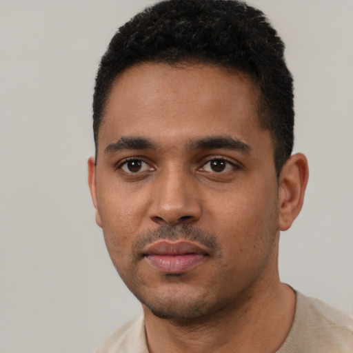 Neutral black young-adult male with short  black hair and brown eyes