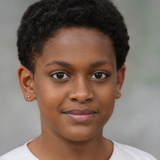 Joyful black child female with short  brown hair and brown eyes