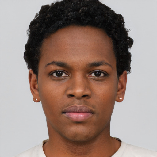 Neutral black young-adult female with short  black hair and brown eyes