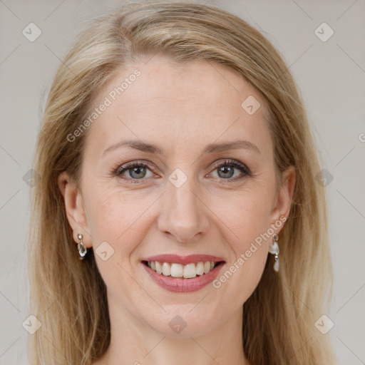 Joyful white young-adult female with long  brown hair and blue eyes