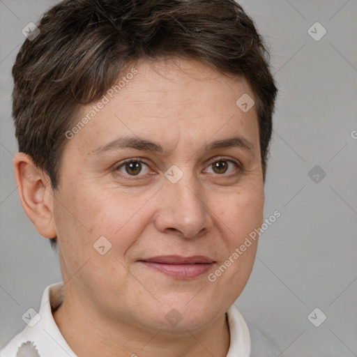 Joyful white adult female with short  brown hair and brown eyes