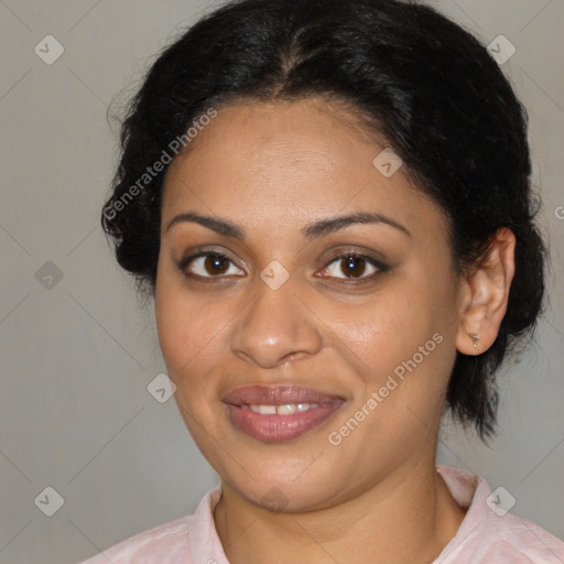 Joyful black young-adult female with medium  brown hair and brown eyes