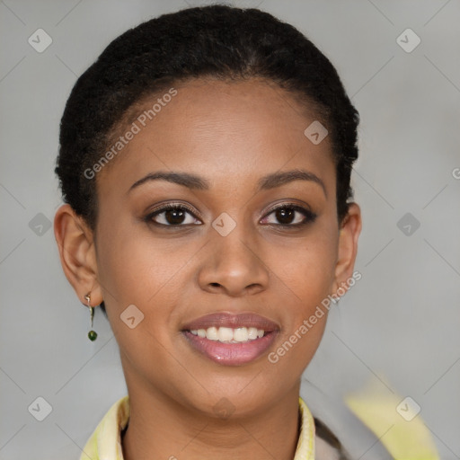 Joyful black young-adult female with short  brown hair and brown eyes