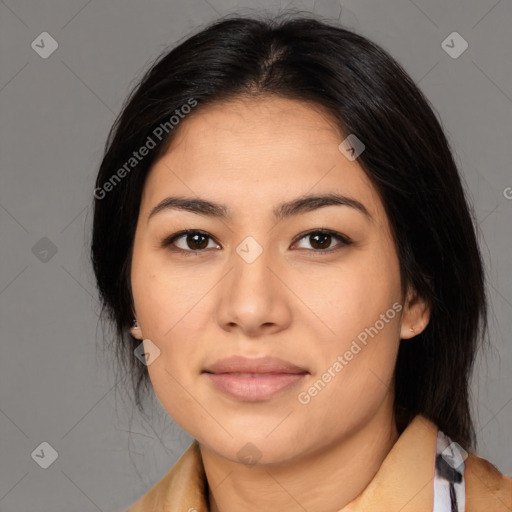 Joyful latino young-adult female with medium  black hair and brown eyes